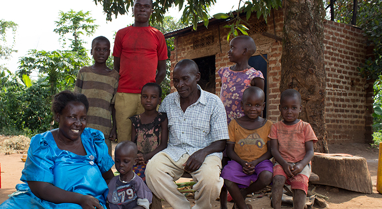 Gertrude and her husband with some of the 10 homeless children they look after.